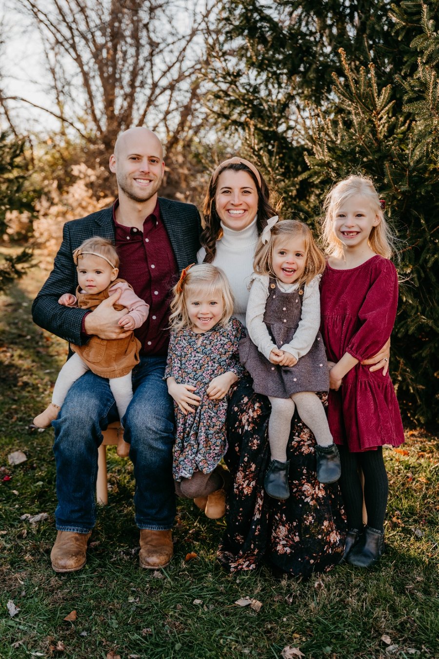 Adam Boonzaayer with his wife and four daughters